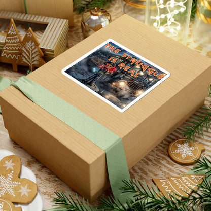The Struggle Is Real kiss-cut sticker on a gift box — white finish, 4″ × 4″