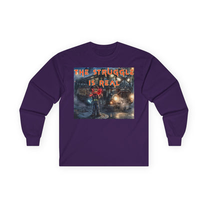 The Struggle Is Real long sleeve tee featuring a moody cinematic street scene by Reese Wilson