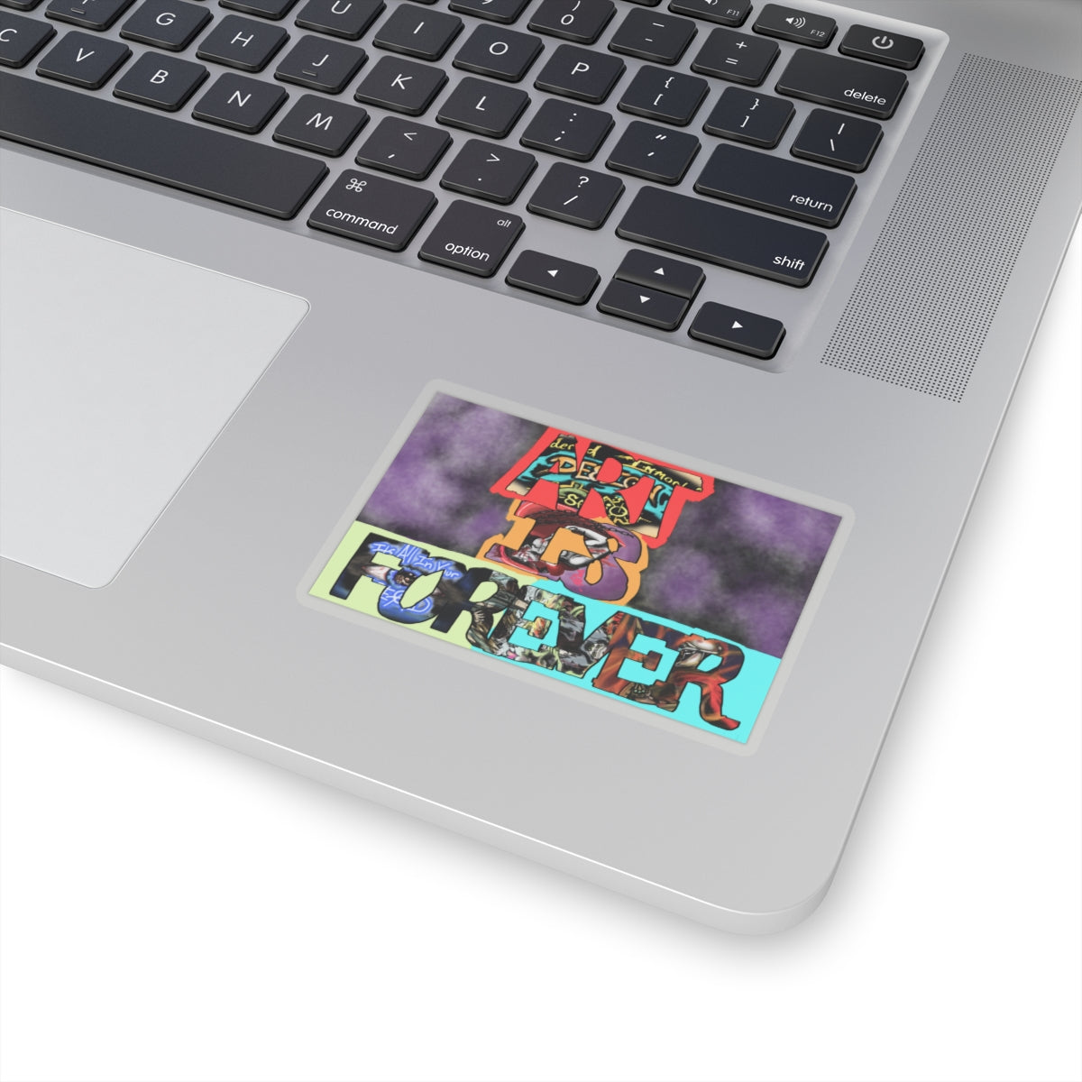 Art Is Forever kiss-cut sticker on a laptop — transparent finish, 3″ × 3″