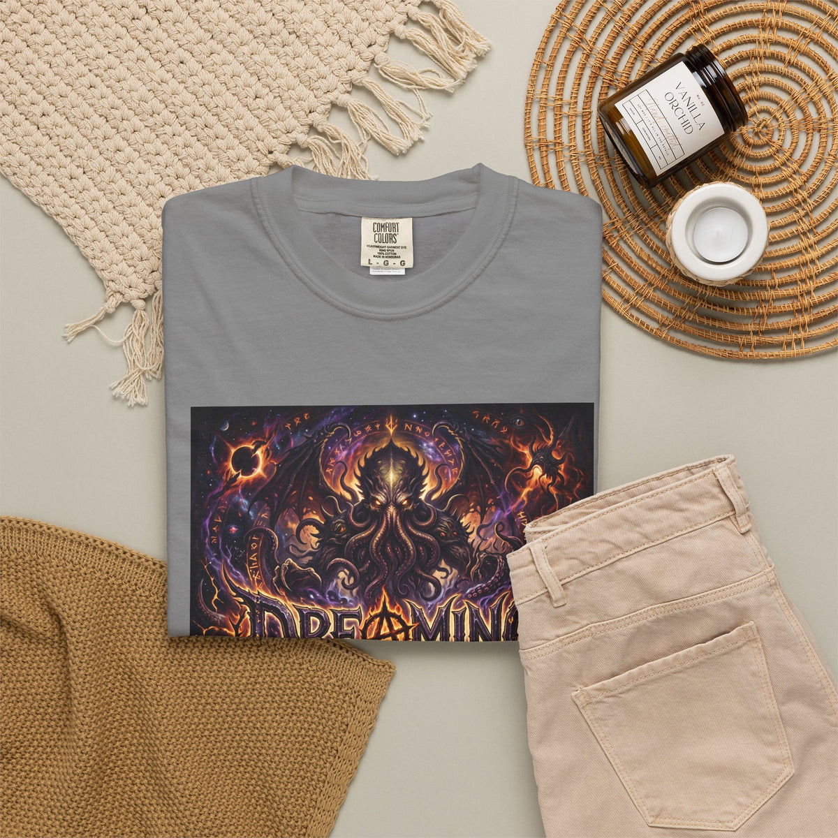 Dreaming of Chaos heavyweight tee — grey, flat lay styled with props